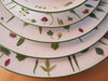 HERMES Discontinued Unused "Mesclun" 7 Piece Porcelain Set 4 Plates, 1 Cream Bowl, 1 Spice Bowl, 1 Tumbler