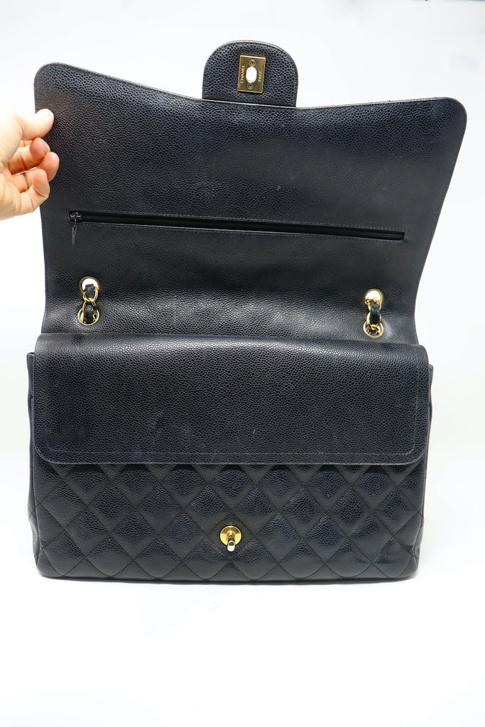 Chanel Double Flap Maxi Black Caviar with Gold Hardware - Bags - Kabinet  Privé