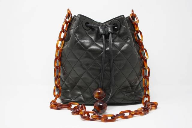 CHANEL Lambskin Woven Tortoise Drawstring Pouch Bag Black 1235875