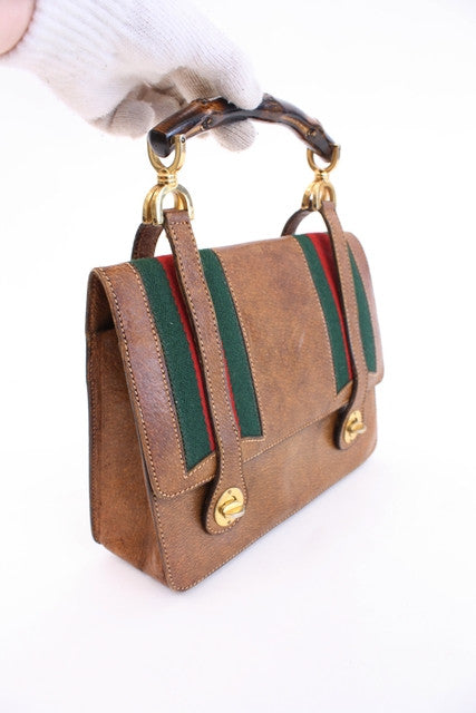 Gucci Pre-Owned 1960s Bamboo flap drawstring backpack - Cotton pocket  square Gucci - IetpShops Australia