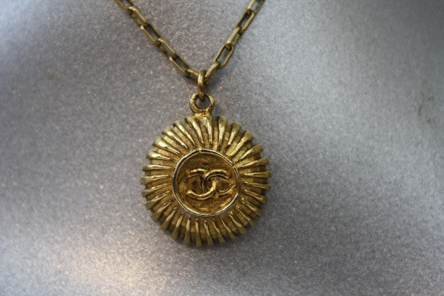 Vintage 70's CHANEL Gold CC Starburst Pendant on Gold Chain