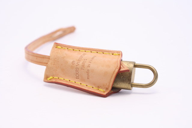 LOUIS VUITTON Lock & Key with Leather Case at Rice and Beans Vintage