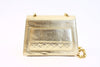 Vintage Chanel gold flap bag
