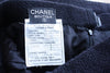 Vintage Chanel black boucle jacket skirt suit