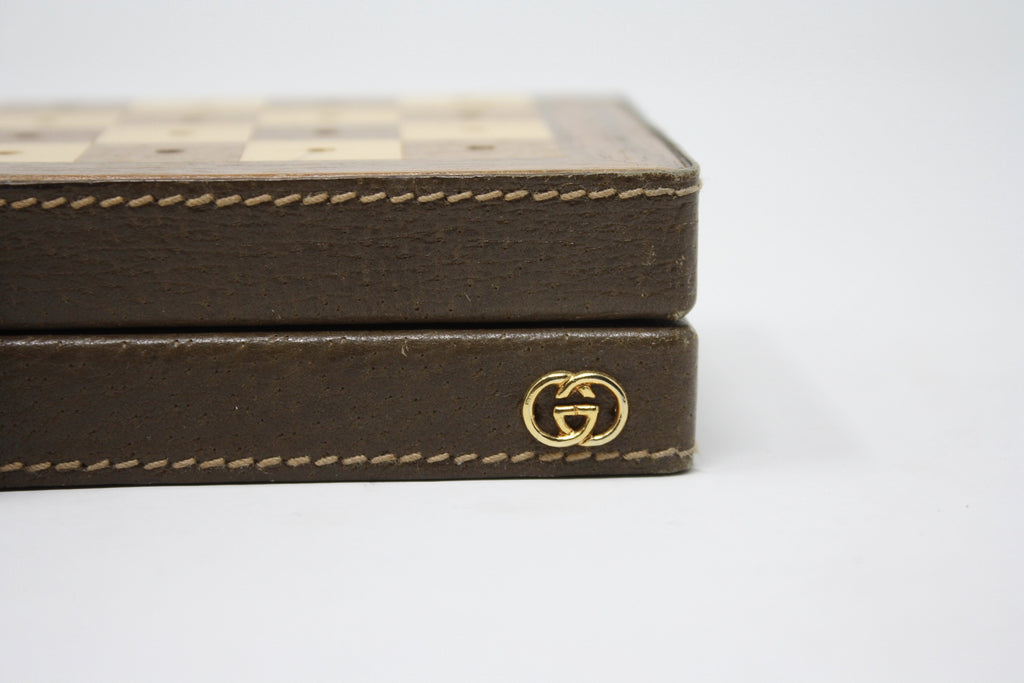 Lot 95 - A GUCCI VINTAGE WOODEN TRAVEL CHESS SET