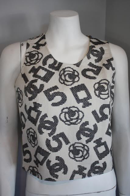 CHANEL 06P Quilted Tank Shell with CC Camellia Flowers, Perfume Bottles & More